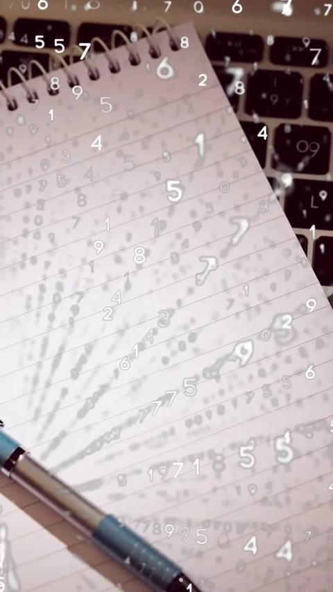 Spiral pad rotating while camera shifting showing keys pen ink stain numbers Stock Footage 330273114