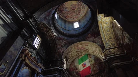 Spiral pan around the dome and apse of Sant'Andrea delle Fratte, Rome Stock Footage 154248664