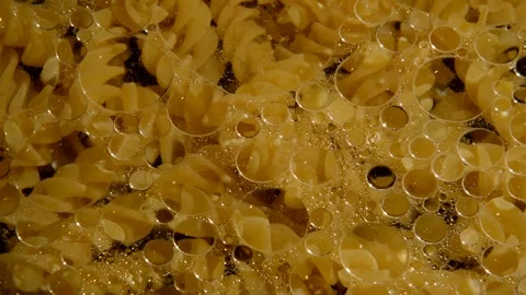 Spiral pasta is being prepared 動画素材 310817942