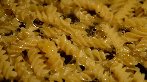 Spiral pasta is being prepared 動画素材 310820000