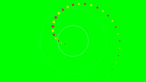 A spiral pattern of alternating yellow and pink dots on a green background Stock Footage 340903588