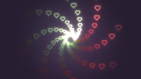 Spiral pattern of hearts in red and green colors on dark Stock Footage 339324195