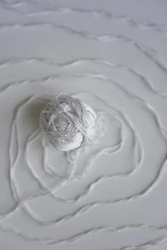 The spiral pattern of the white thread with ball 写真素材
