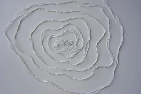 The spiral pattern of the white thread Stock Photos