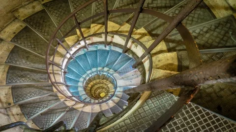 Spiral staircase inside Arc de Triomphe in Paris, zoom in Stock Footage 99590562