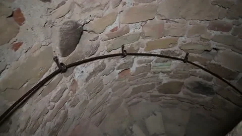 Spiral stone staircase in an old castle. Descent down the stairs. Stock Footage 201440938