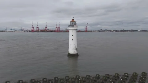 Spiraling Flight Around Ocean Lighthouse Stock Footage 311485189