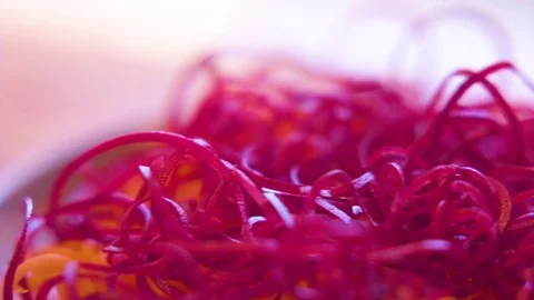 Spiralized cabbage and beetroot in bowl Stock Footage 76138766