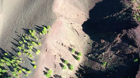Spiralling aerial view of small volcanic crater, Tenerife Stock-Footage 231783058