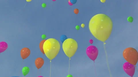 Spiralling colored balloons in a blue sky Video stock 40902882