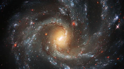 Spiralling galaxy with glittering stars and nebulae slow zoom in Stock Footage 154434211