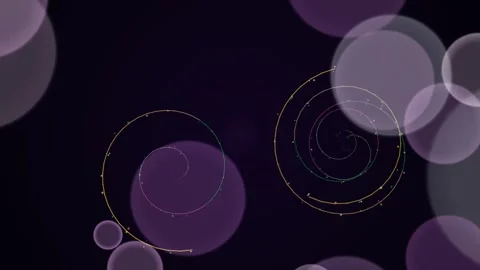 Spirals over a dark background with blurred, round, light orbs 動画素材 331650061