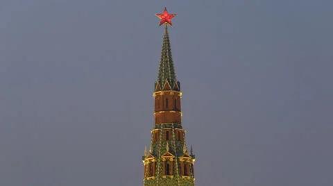 Spire of Kremlin tower with ruby star on twilight sky Stock Footage 65457534