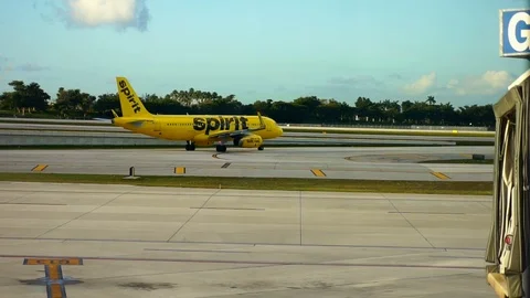 Spirit airlines airplane aircraft plane taxing preparing for departure take off  Stock Footage