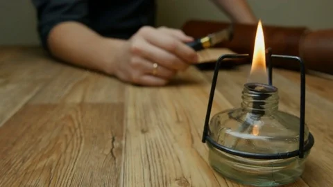 Spirit lamp is on the table Video stock 81418551
