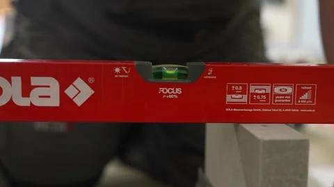 Spirit level ensures perfect horizontal alignment. Precision measuring tool for Stock Footage 334743438