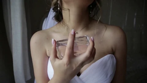 Spirits in hands of the bride close-up Stock Footage 81319657