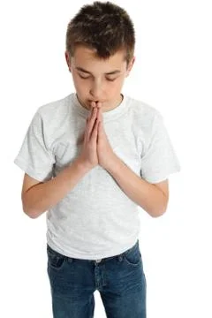 Spiritual boy praying Stock Photos