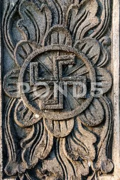 Spiritual hindu symbol -swastika on the temple Stock Photos