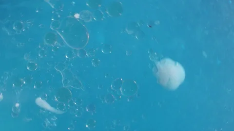 Spirling light blue liquid bubbling textures. Macro abstract background Stock-Footage 118277811