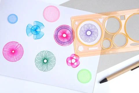 Spirograph ruler on white background. Drawing the spirograph pattern 写真素材