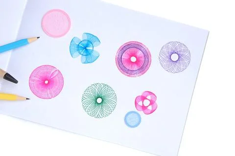 Spirograph ruler on white background. Drawing the spirograph pattern 写真素材