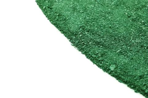 Spirulina algae powder on white background. Space for text Foto stock