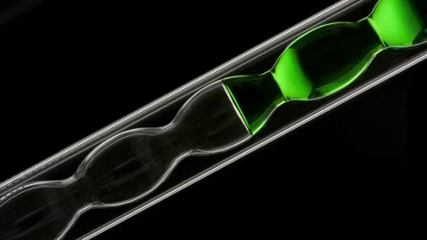 Spirulina solution filling and draining inclined bulb condenser Stock Footage 341110926