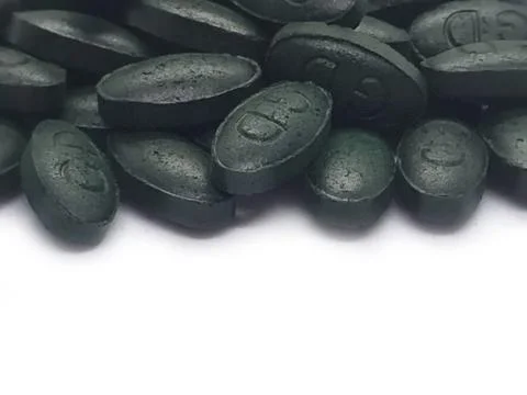 Spirulina tablets Stock Photos