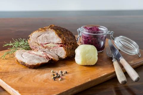 Spit roast with red cabbage Stock Photos