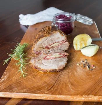 Spit roast with red cabbage Stock Photos