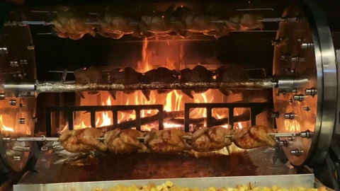 Spit roasted chickens are cooking in an oven, grill Stock-Footage 200856177