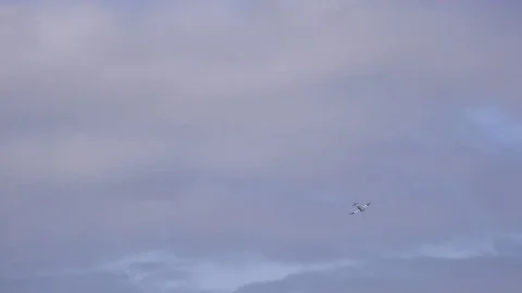Spitfire WW2 Military plane doing aerobatics in air show UK 4K Stock Footage 115964983