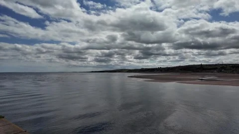Spittal Beach and River Tweed Estuary under Dramatic Clouds Video stock 346369459