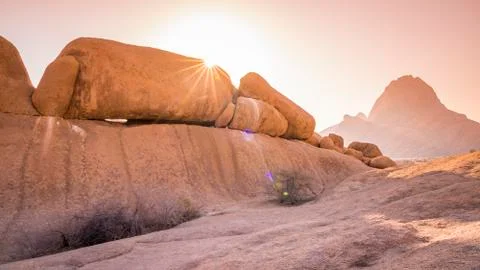 The Spitzkoppe mountain at sunset in Namibia. Stock Photos