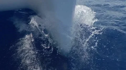 Splash on the bow of a catamaran sailboat in speed - Close-up shot Slow Motion Video stock 133464802