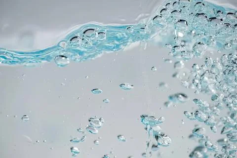 Splash of clear water with bubbles in motion Stock-Fotos
