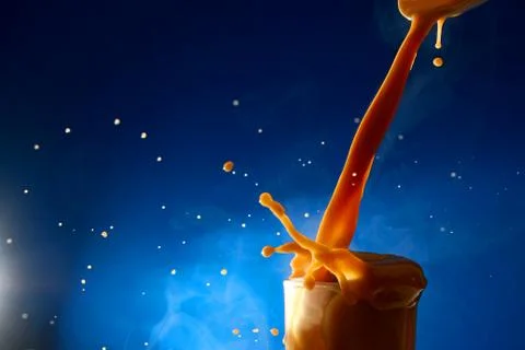 Splash of coffee latte Stock Photos