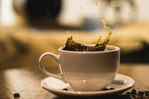 Splash in a coffee Stock Photos