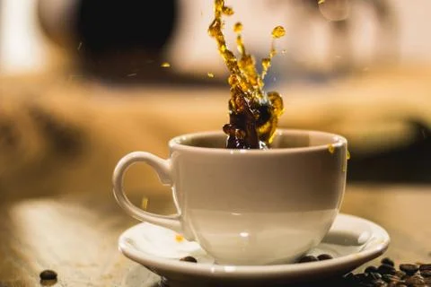 Splash in a coffee Stock Photos
