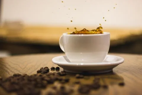 Splash in a coffee Stock Photos