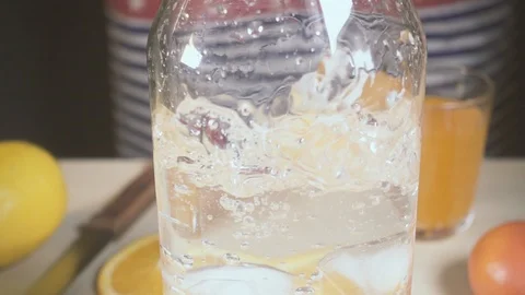 Splash from fallen into a carafe with water ice slow motion Stock Footage 87946313
