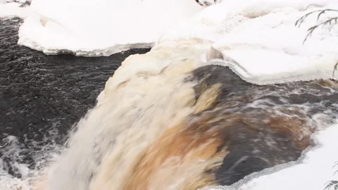 Splash ice splashing water Interstate Falls Montreal River Hurley Wisconsin Video stock 232386600