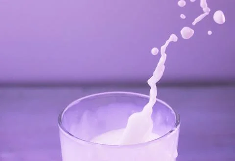 Splash of milk Stockfoto's