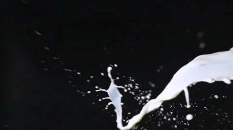 Splash of milk stream and strawberry Stock Footage 63094430