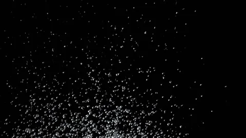 Splash of rain drops. Black background. Slow motion Stock Footage 89240774