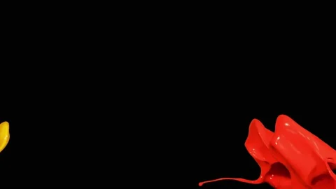 Splash of red and yellow paint liquid in slow motion isolated on black (4K) Stock Footage 137112327