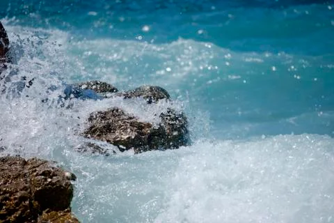 Splash on the rocks Stock Photos