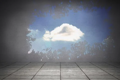 Splash on wall revealing cloud in sky Foto stock