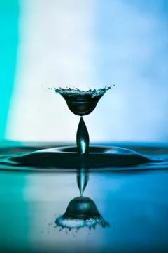Splash of water on blue background Stock-Fotos